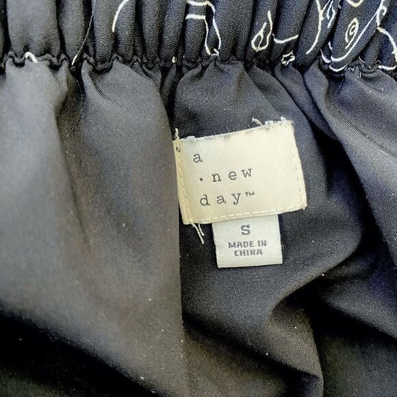 a new day Black Abstract Face Art Pleated A-Line Skirt - Picture 6 of 7